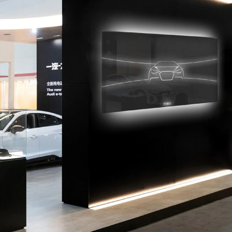 Laserung auf schwarzem Glas im Showroom
